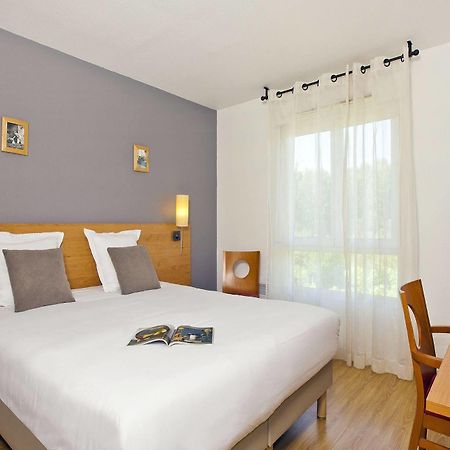 Sejours & Affaires Annecy Le Pont Neuf Aparthotel Cran-Gévrier Exterior foto